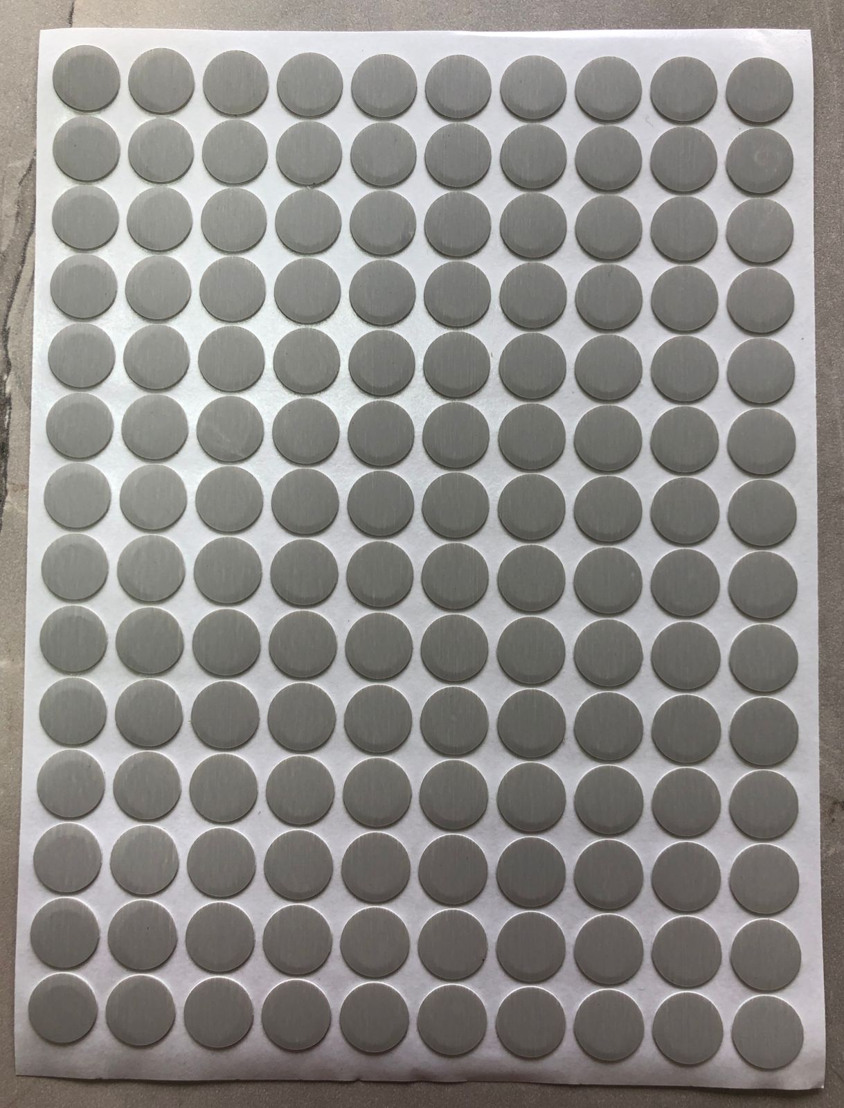 TAPITAS ADHESIVAS COLOR GRIS X PLANCHA